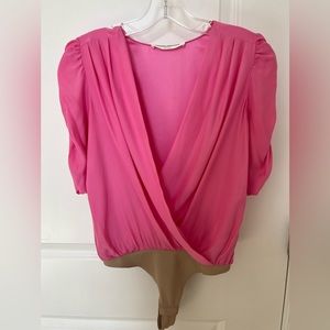 Amanda Uprichard pink bodysuit.